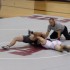 An AHS wrestler takes on his McCloud opponent.
