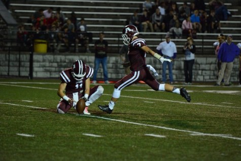 Jackson McFarlane (7) attempts the point-after-touchdown.