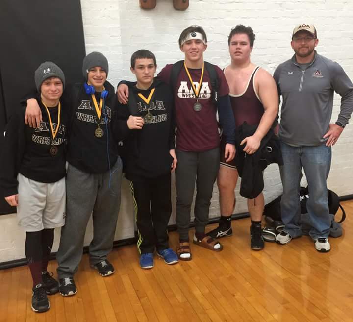 Members of the AHS wrestling team after the McAlester wrestling tournament.