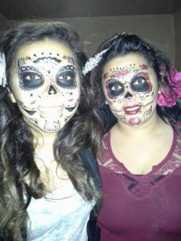 Iris Arredondo and Graciela Chapa celebrating Day of the Dead, dressed as Sugar Skulls.