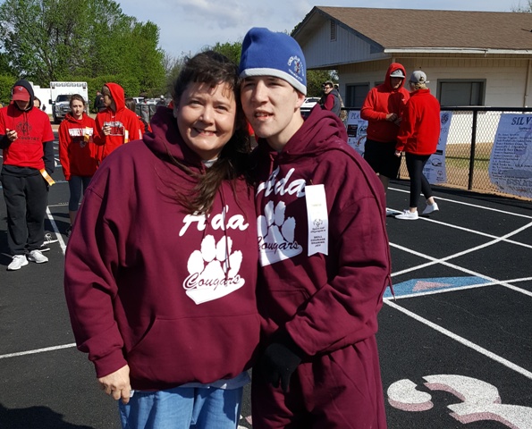 Special education teacher Sheri Wright with student, Major Rogers