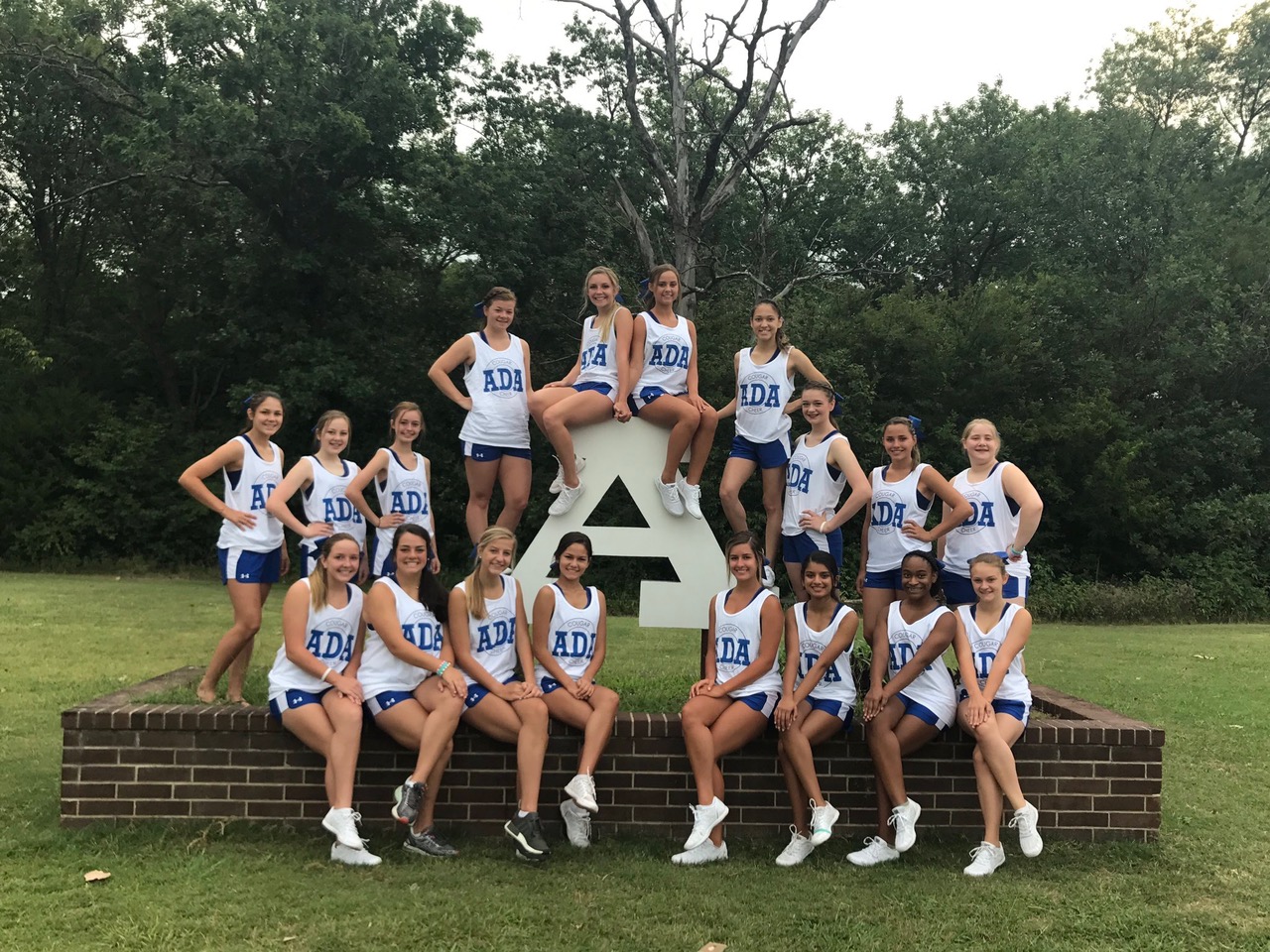 The Ada High cheerleaders pose for one last photo before heading off to cheer camp, not knowing they will be returning with a bid to the 2018 NCA All-Star National Competition in Dallas, Texas.