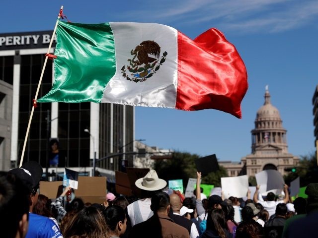 Dreamers protesting by waving the Mexican flag, showing what they can do with DACA 