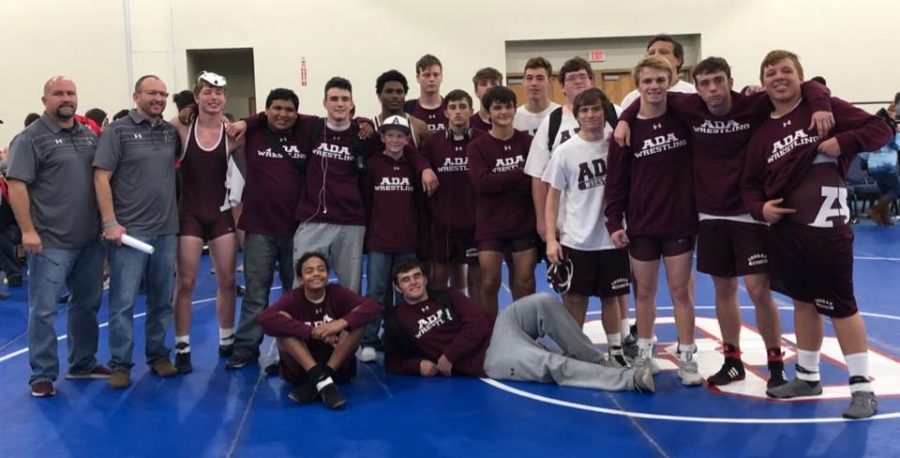 Ada wrestlers pose after placing 5th at the Florida tournament.