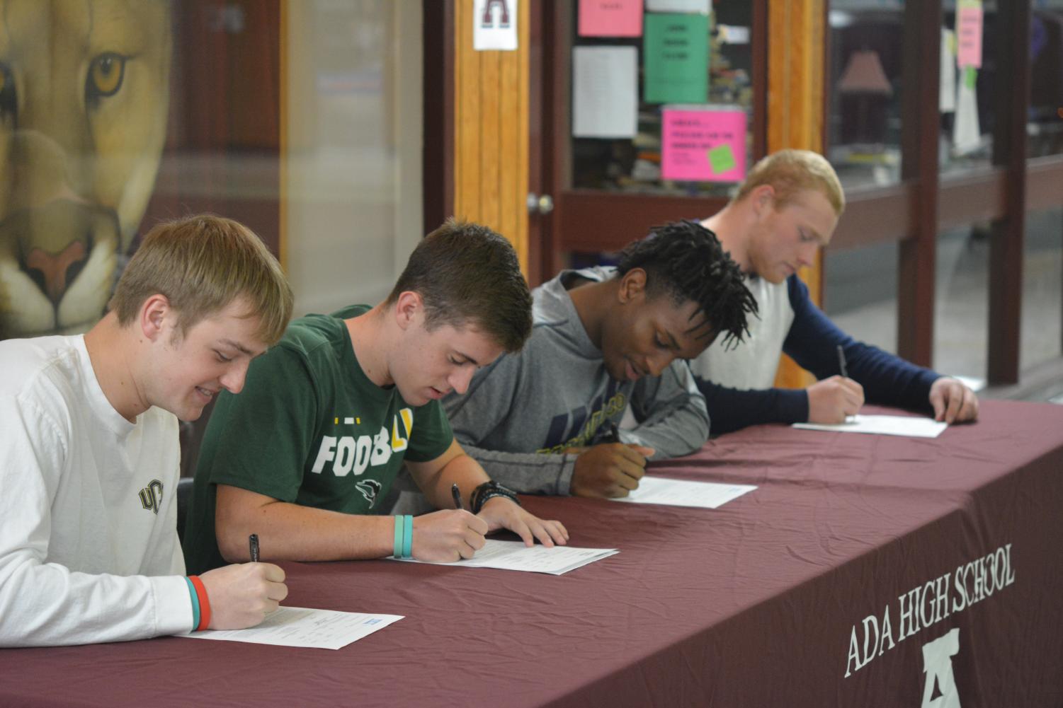 On National Signing Day, senior football players Christian Maloy, Jackson McFarlane, Kylen Cooper and Jacob Smalley put pen to paper, committing to their respective future teams.