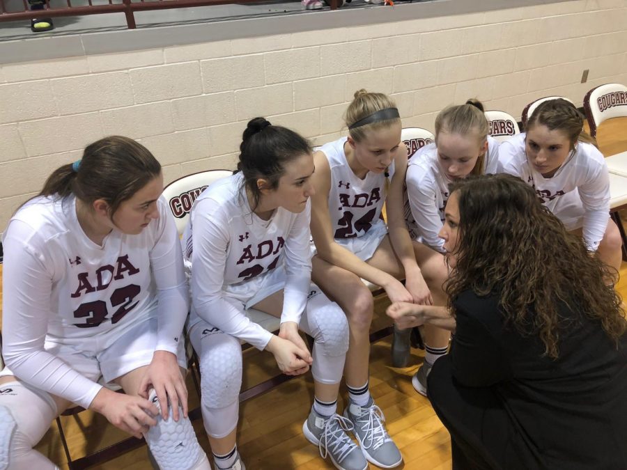 Head Coach Christie Jennings gives her team some quick advice during a time out.